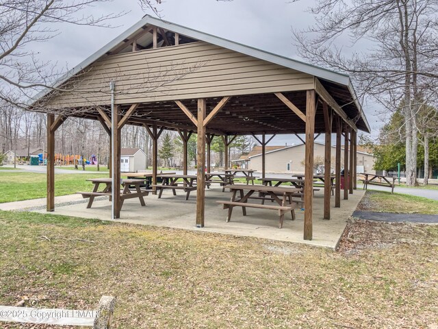 view of property's community featuring a lawn and a gazebo