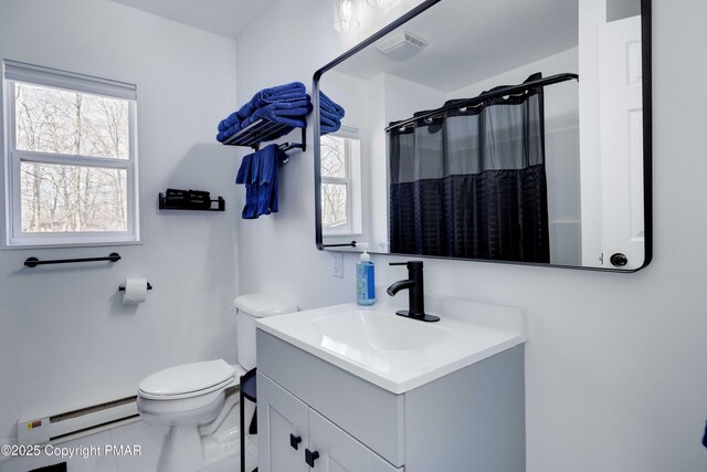 bathroom featuring visible vents, toilet, a baseboard heating unit, vanity, and a shower with curtain