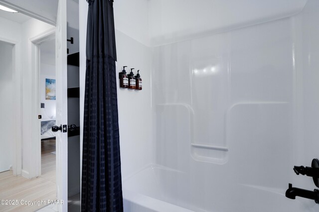 full bathroom featuring shower / bath combination with curtain