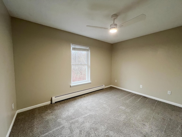 211 Beaver Dam Rd, Long Pond, PA 18334 - spare room with a baseboard radiator, ceiling fan, dark carpet, and baseboards