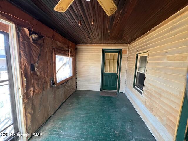 doorway to property featuring a porch