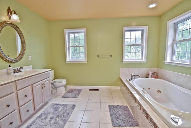 210 Edwin Ln, Stroudsburg, PA 18360 - bathroom featuring vanity, a whirlpool tub, toilet, tile patterned floors, and baseboards