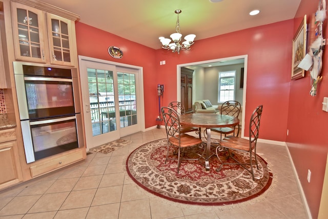 210 Edwin Ln, Stroudsburg, PA 18360 - dining room with light tile patterned floors, a chandelier, baseboards, and recessed lighting