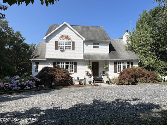 view of front of home with a chimney