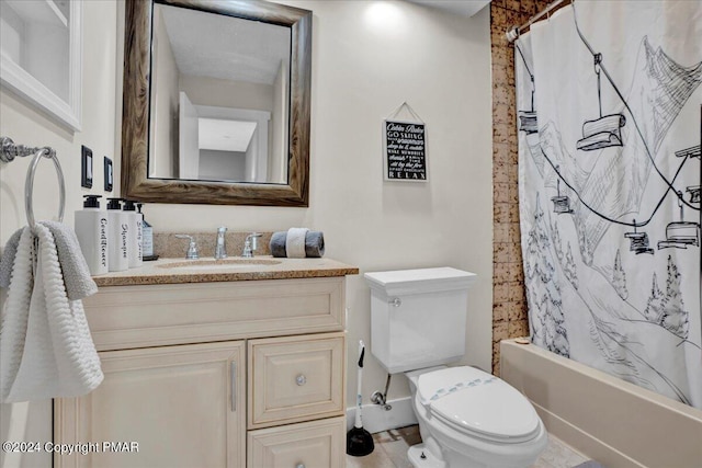 full bathroom with toilet, shower / bath combo with shower curtain, and vanity