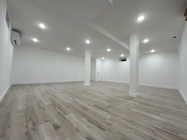 3015 Mountain Ter, Stroudsburg, PA 18360 - finished below grade area featuring a wall mounted AC, light wood-style floors, and recessed lighting