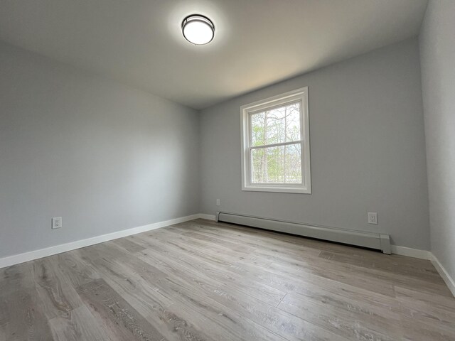3015 Mountain Ter, Stroudsburg, PA 18360 - spare room with baseboard heating and wood finished floors