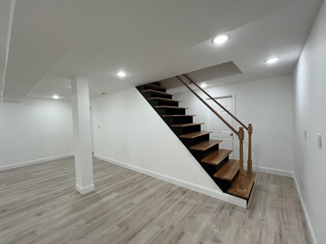 3015 Mountain Ter, Stroudsburg, PA 18360 - finished below grade area with stairway, light wood finished floors, and recessed lighting