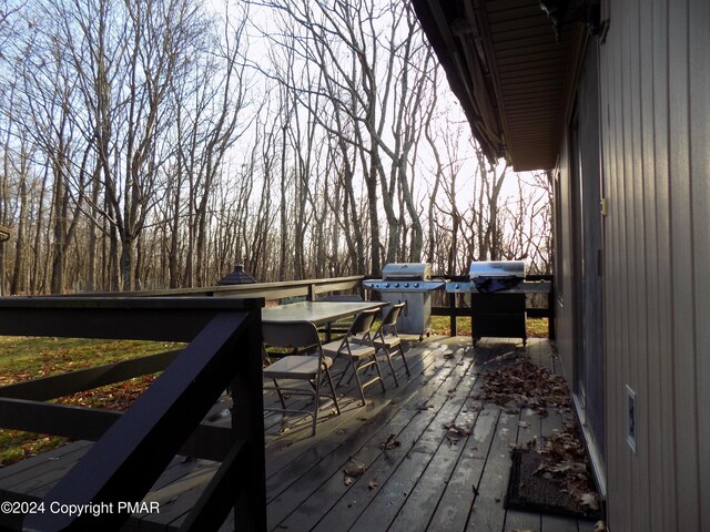 wooden terrace with grilling area