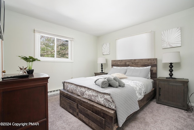 bedroom featuring a baseboard radiator and light carpet