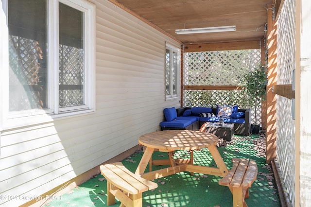 exterior space featuring an outdoor hangout area