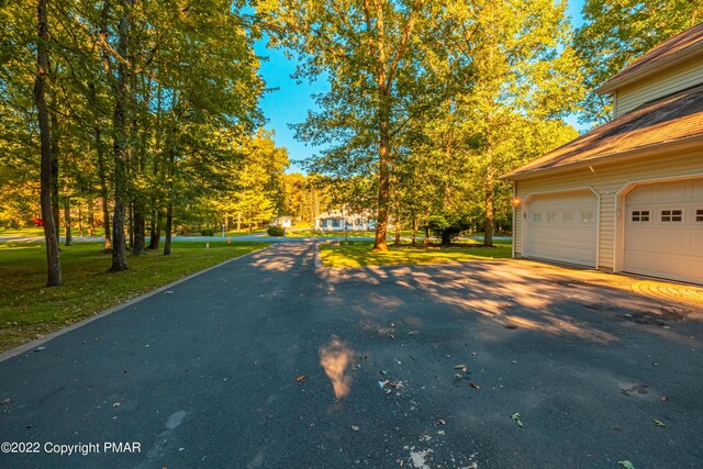 exterior space with a garage