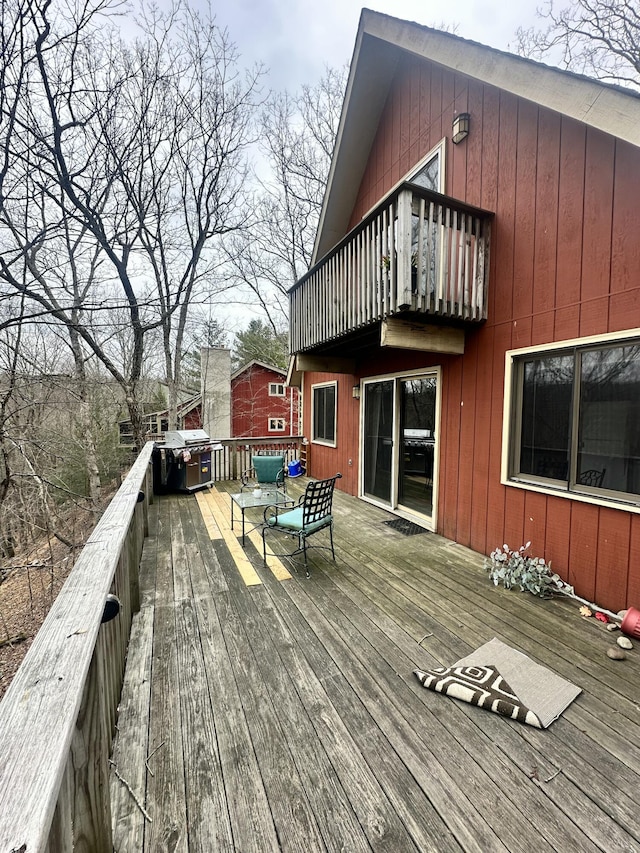 wooden deck with area for grilling