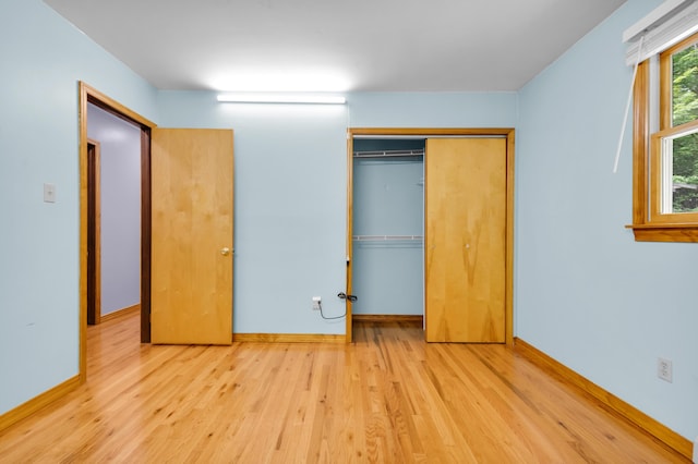 4620 Buck Valley Cir E, Stroudsburg, PA 18301 - unfurnished bedroom featuring wood finished floors and a closet