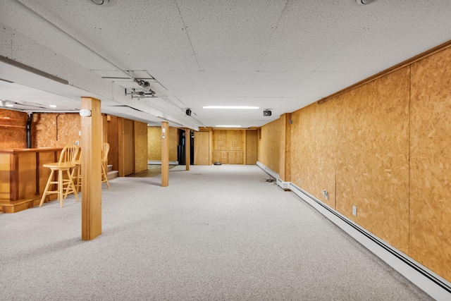 4620 Buck Valley Cir E, Stroudsburg, PA 18301 - finished basement with a baseboard radiator, light colored carpet, and a dry bar