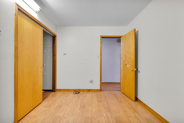 4620 Buck Valley Cir E, Stroudsburg, PA 18301 - unfurnished bedroom featuring light wood finished floors and a closet