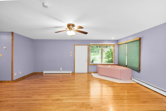 4620 Buck Valley Cir E, Stroudsburg, PA 18301 - unfurnished room featuring baseboard heating, ceiling fan, light wood finished floors, and a smoke detector
