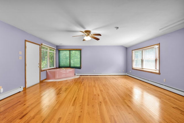 4620 Buck Valley Cir E, Stroudsburg, PA 18301 - empty room with a ceiling fan, plenty of natural light, baseboard heating, and light wood-style flooring
