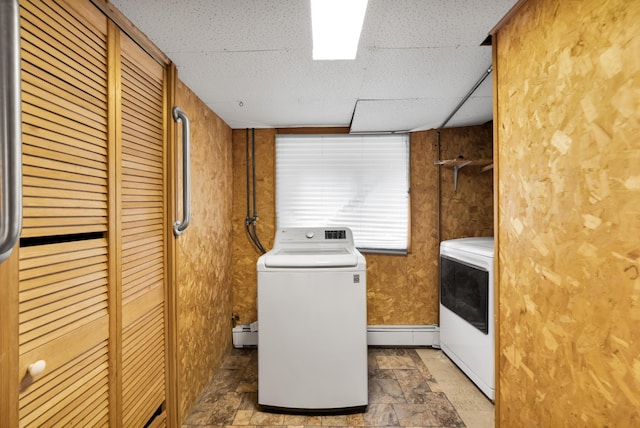 4620 Buck Valley Cir E, Stroudsburg, PA 18301 - laundry room with baseboard heating, stone finish floors, and washer and dryer