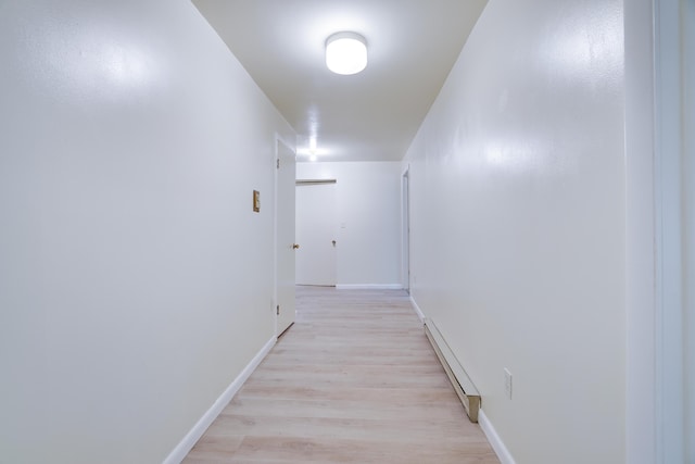 289 Towamensing Trl, Albrightsville, PA 18210 - hall with a baseboard heating unit, light wood-style floors, and baseboards