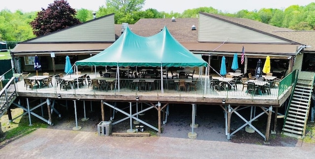 289 Towamensing Trl, Albrightsville, PA 18210 - rear view of property with a wooden deck and outdoor dining area