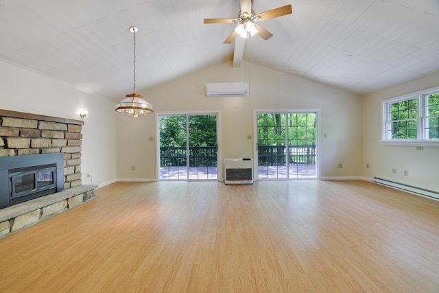 289 Towamensing Trl, Albrightsville, PA 18210 - unfurnished living room with a wall mounted AC, heating unit, a fireplace, light wood-style flooring, and a chandelier