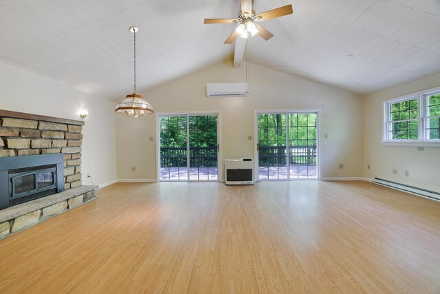 289 Towamensing Trl, Albrightsville, PA 18210 - unfurnished living room with a wall mounted AC, heating unit, a fireplace, light wood-style flooring, and a chandelier