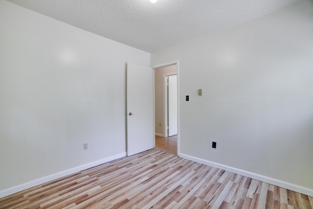 289 Towamensing Trl, Albrightsville, PA 18210 - spare room with light wood-style flooring, a textured ceiling, and baseboards