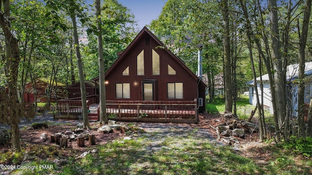 view of front of property with a deck