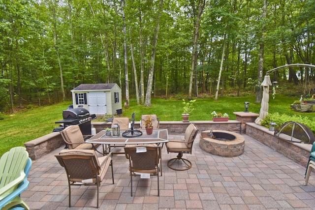 603 Washington Xing, East Stroudsburg, PA 18301 - view of patio / terrace featuring a fire pit, outdoor dining area, a storage unit, and area for grilling