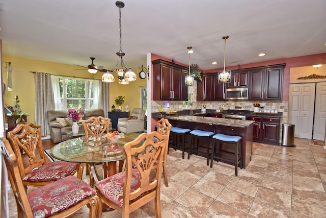 603 Washington Xing, East Stroudsburg, PA 18301 - dining space featuring a chandelier, recessed lighting, and a ceiling fan
