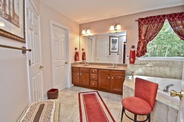 603 Washington Xing, East Stroudsburg, PA 18301 - bathroom featuring double vanity, a bathtub, and marble finish flooring