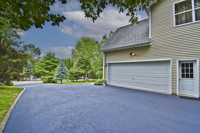 603 Washington Xing, East Stroudsburg, PA 18301 - garage with asphalt driveway