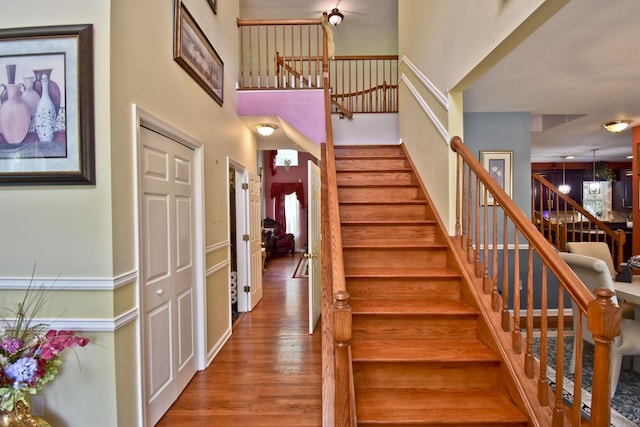 603 Washington Xing, East Stroudsburg, PA 18301 - stairs featuring wood finished floors and a high ceiling