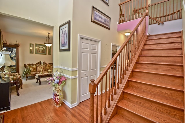 603 Washington Xing, East Stroudsburg, PA 18301 - stairway featuring a towering ceiling and wood finished floors