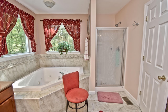 603 Washington Xing, East Stroudsburg, PA 18301 - full bathroom with a stall shower, a jetted tub, and vanity