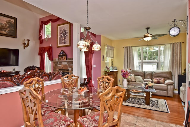 603 Washington Xing, East Stroudsburg, PA 18301 - dining room with ceiling fan and a tiled fireplace