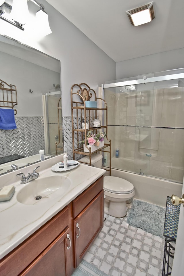 603 Washington Xing, East Stroudsburg, PA 18301 - full bath with vanity, tile patterned floors, and combined bath / shower with glass door