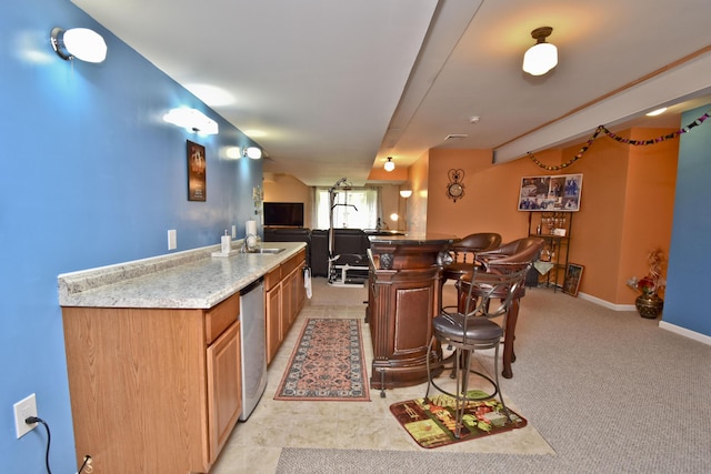 603 Washington Xing, East Stroudsburg, PA 18301 - kitchen with a breakfast bar, stainless steel dishwasher, open floor plan, and a center island
