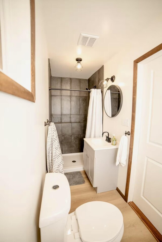 71 Dogwood Dr, Jim Thorpe, PA 18229 - bathroom featuring vanity, a stall shower, and wood finished floors