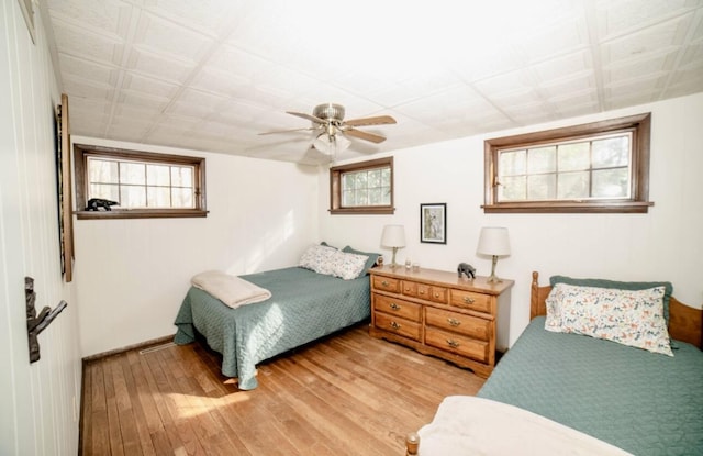 71 Dogwood Dr, Jim Thorpe, PA 18229 - bedroom featuring light wood finished floors, multiple windows, and a ceiling fan