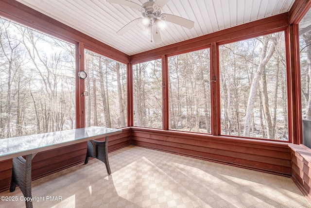 unfurnished sunroom with a wealth of natural light