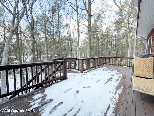 view of snow covered deck