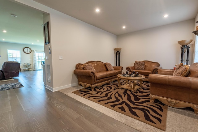living area featuring recessed lighting and wood finished floors