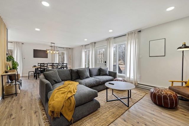 130 Sweet Briar Rd, Pocono Pines, PA 18350 - living area with light wood-style flooring, recessed lighting, a chandelier, a baseboard heating unit, and baseboards