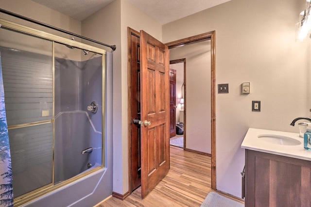 54 Spencer Ln, Albrightsville, PA 18210 - full bathroom with wood finished floors, combined bath / shower with glass door, and vanity