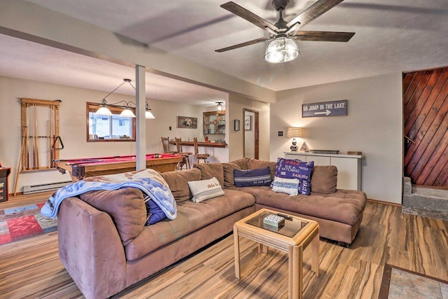 54 Spencer Ln, Albrightsville, PA 18210 - living area with ceiling fan, billiards table, baseboard heating, and wood finished floors