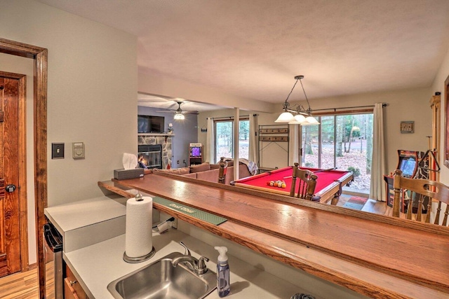 54 Spencer Ln, Albrightsville, PA 18210 - playroom with a stone fireplace, a ceiling fan, and pool table