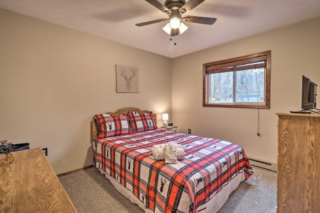 54 Spencer Ln, Albrightsville, PA 18210 - bedroom featuring carpet floors, baseboard heating, and a ceiling fan