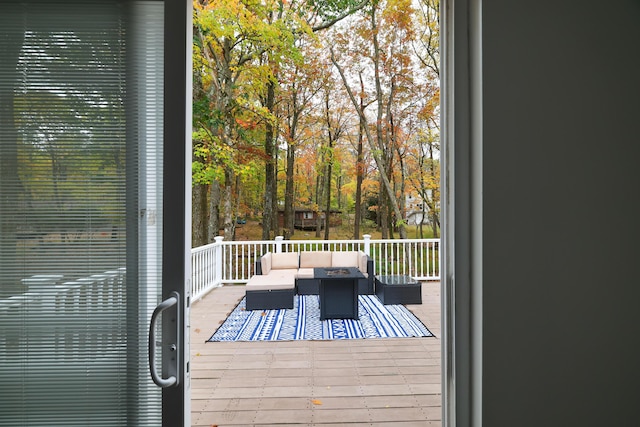 wooden deck featuring an outdoor hangout area